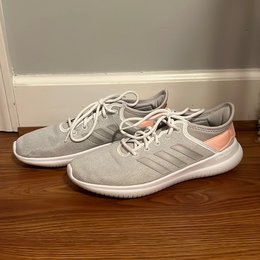 Adidas tennis shoes, size 8, color:light gray with a light pink band on the back
